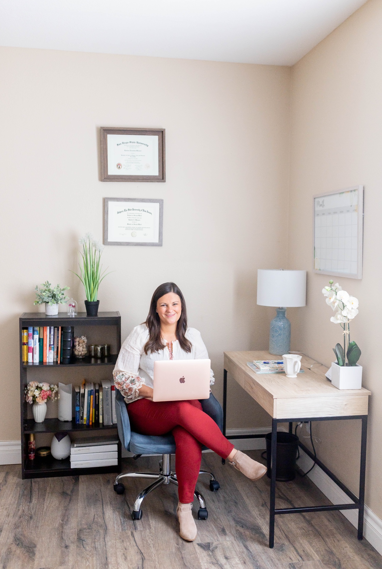 Katelin in her therapy office, warm natural light